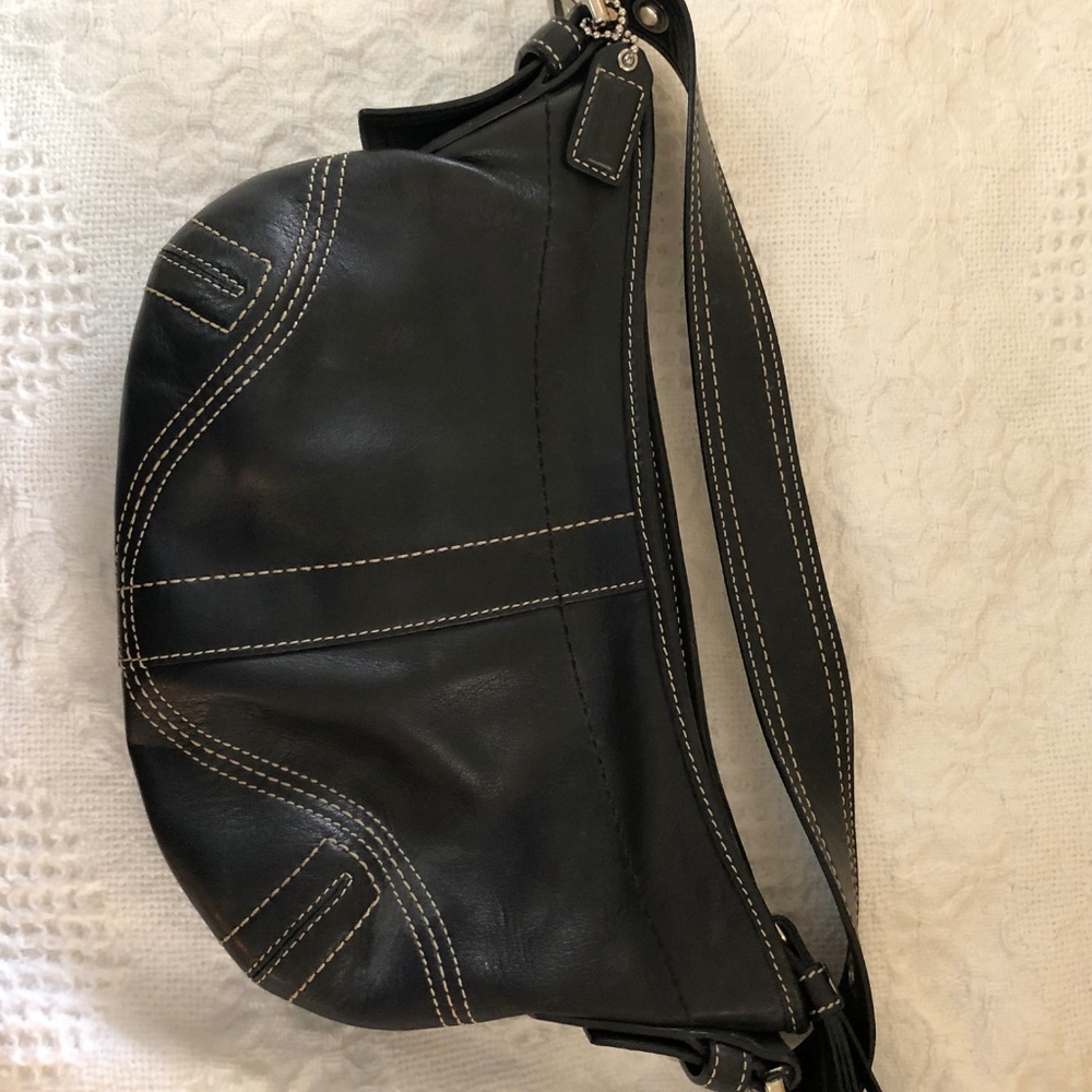 Authentic Coach small bag with serial number inside the bag .